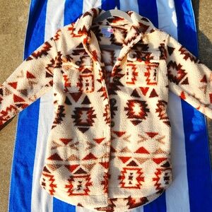 A cute kids size 7/8 beige fleece jacket. Super soft yet affordable